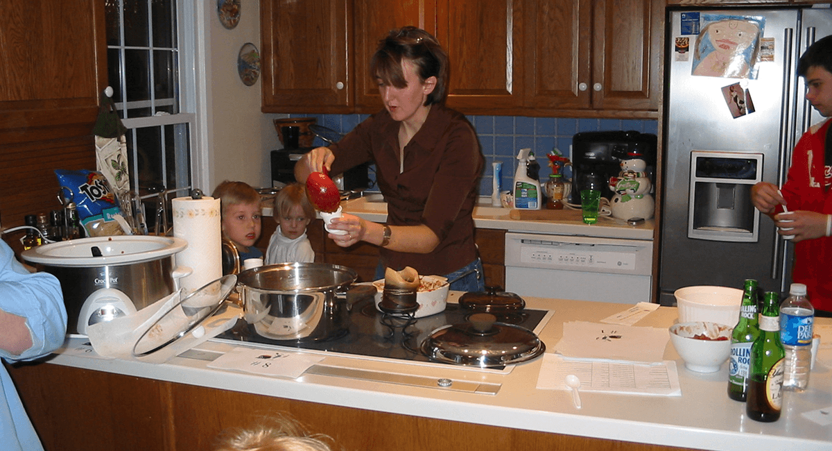 Neighbors cooking together at the chili cook-off